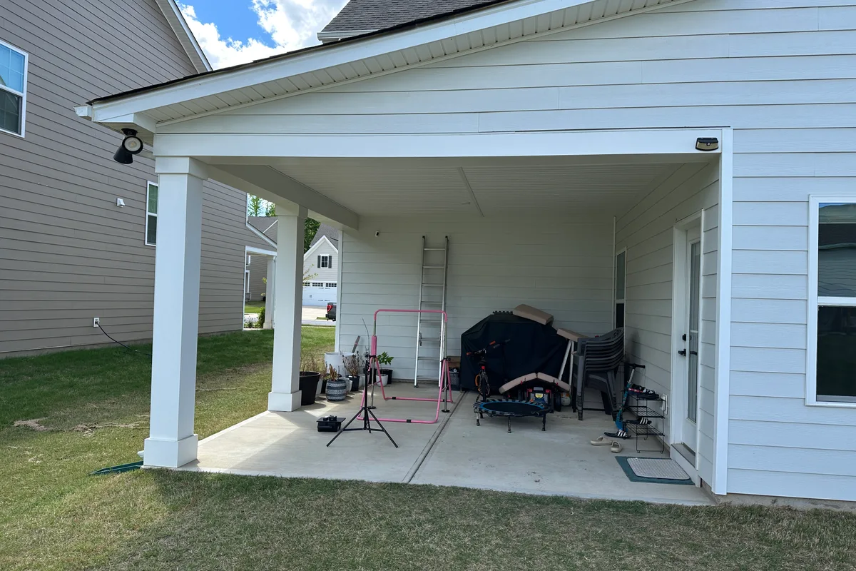 Existing porch structure before glass enclosure installation Indian Trail