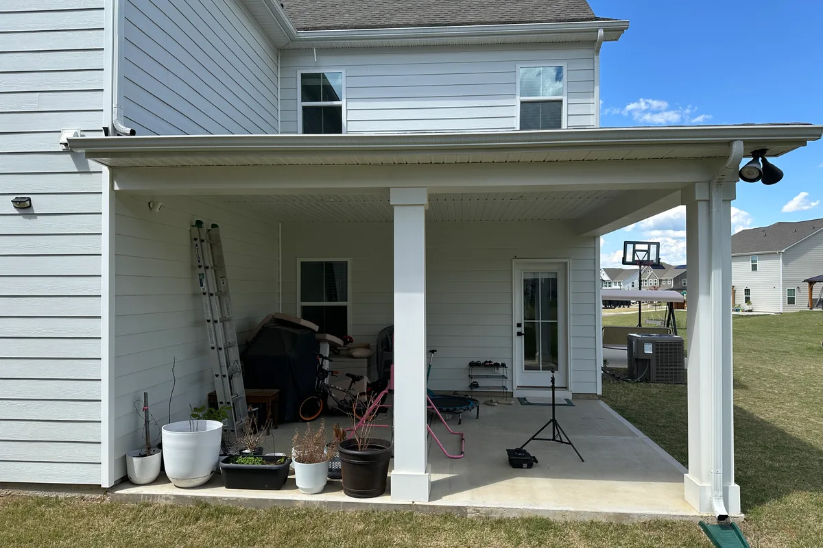 Pre-construction view of porch before 3-season glass room Indian Trail NC