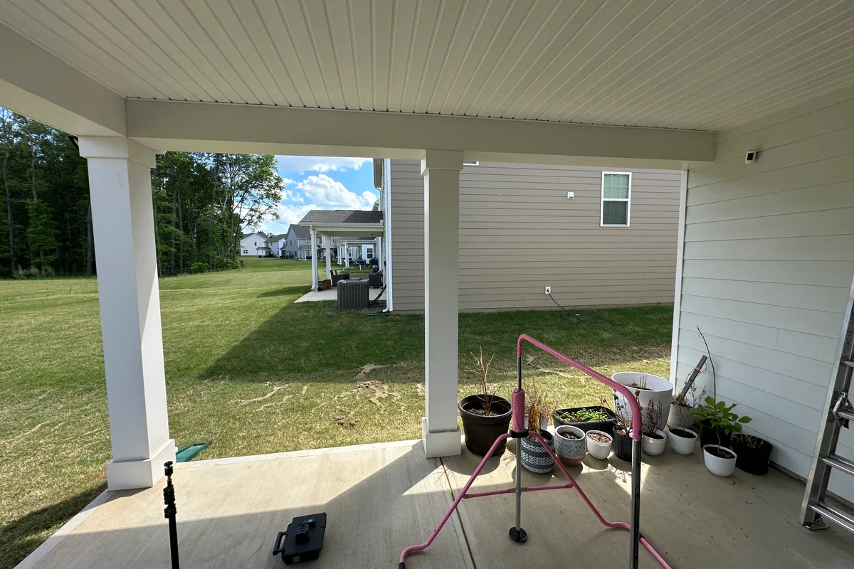 Porch before 3-season glass enclosure contractor project Indian Trail