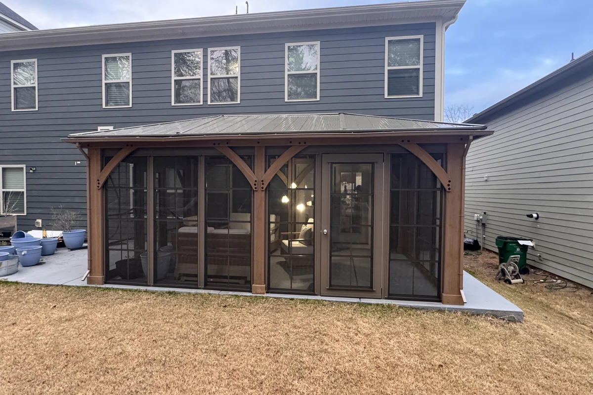 Finished 3-season vinyl film enclosure exterior view in Charlotte NC Clems Branch