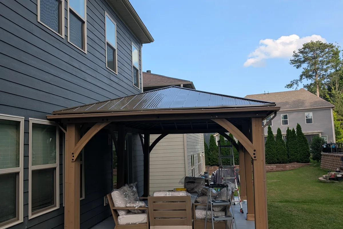 Existing porch structure before vinyl film enclosure installation in Clems Branch