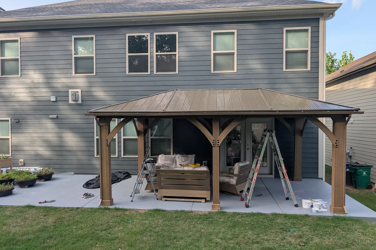 Completed 3-season vinyl film porch enclosure exterior in Clems Branch, Charlotte NC