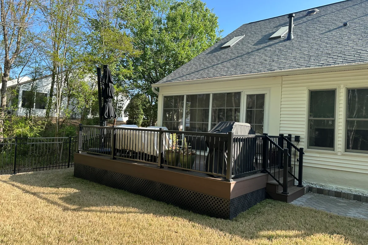 Deck enclosure contractor detail showing vinyl installation Elrose Charlotte NC