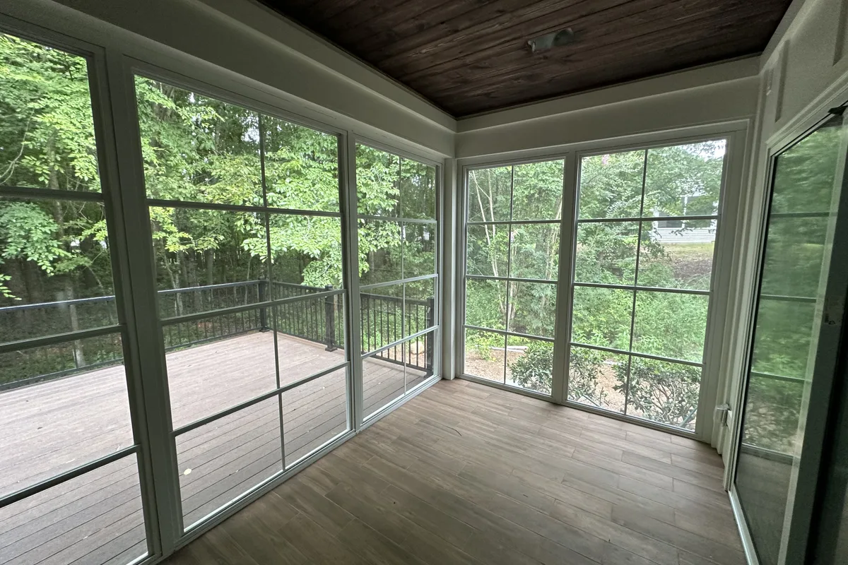 Porch enclosure vinyl detail work by Charlotte NC contractor