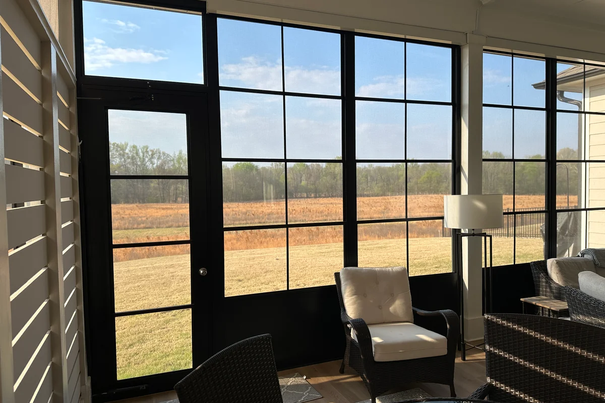 Finished 3-season vinyl film sunroom exterior Encore, Waxhaw NC