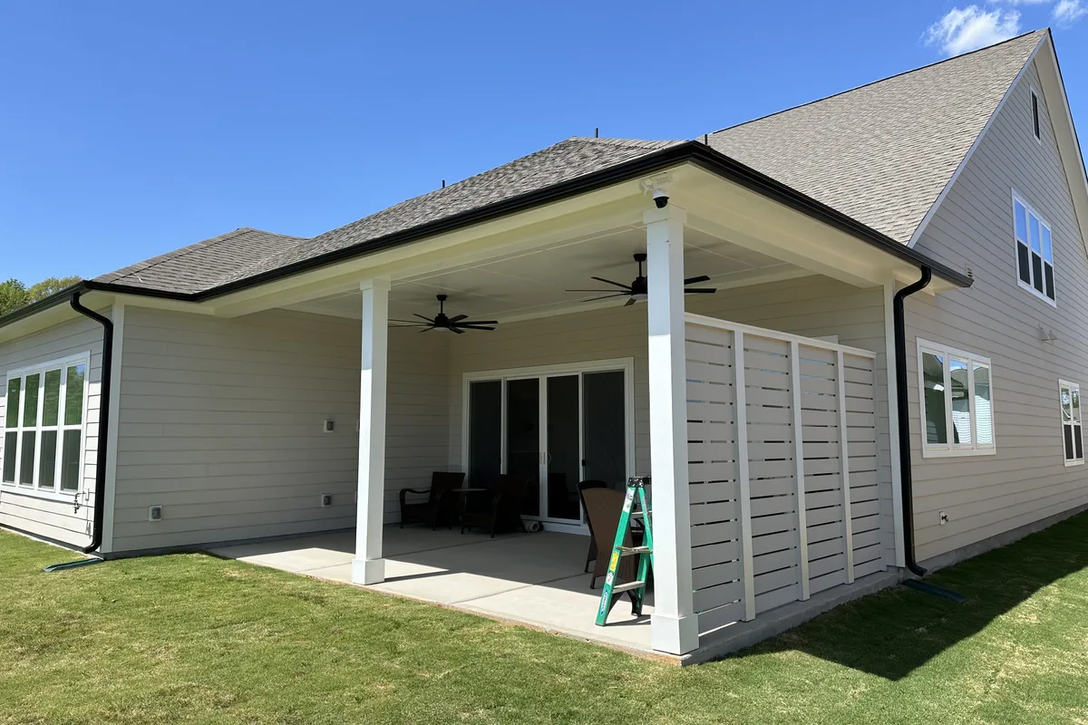 Existing porch structure before 3-season enclosure installation Waxhaw NC