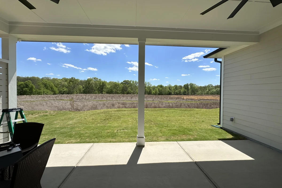 Completed 3-season vinyl film porch enclosure exterior in Encore, Waxhaw NC