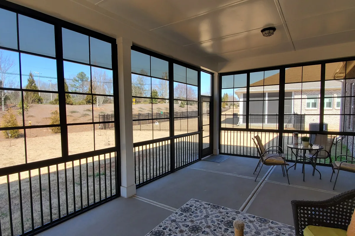 Vinyl film 3-season sunroom enclosure detail at Matthews North Carolina residence