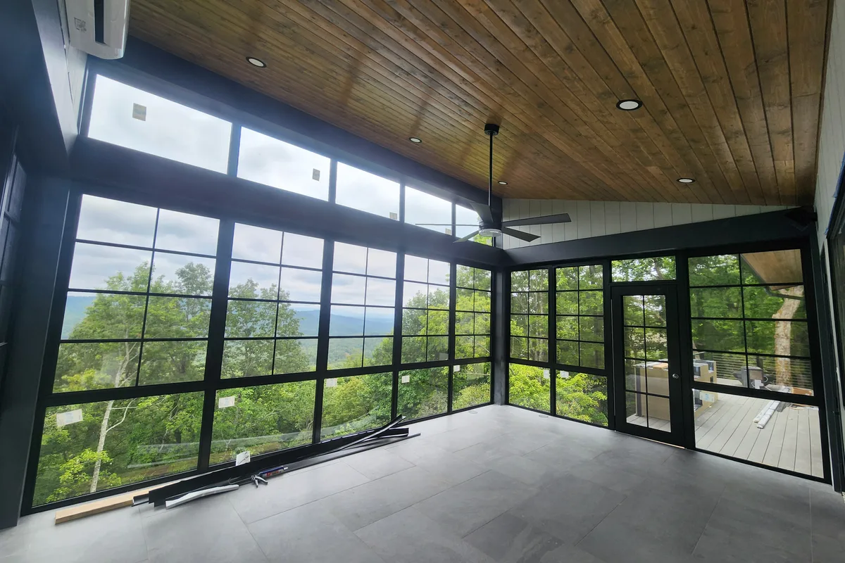 Completed vinyl film porch enclosure detail in Transylvania County NC