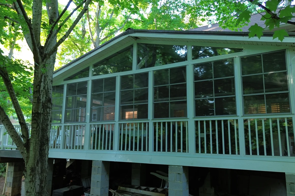 Finished vinyl film porch enclosure exterior view in Rock Hill, York County SC