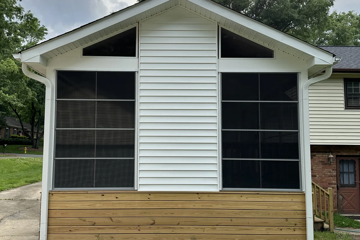 Finished 3-season vinyl film porch enclosure exterior in Summerlin Charlotte NC