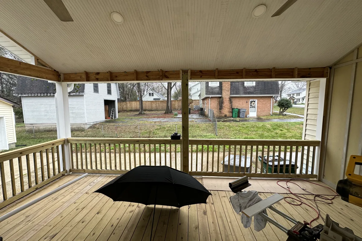 Before photo of open porch ready for vinyl film 3-season enclosure Charlotte