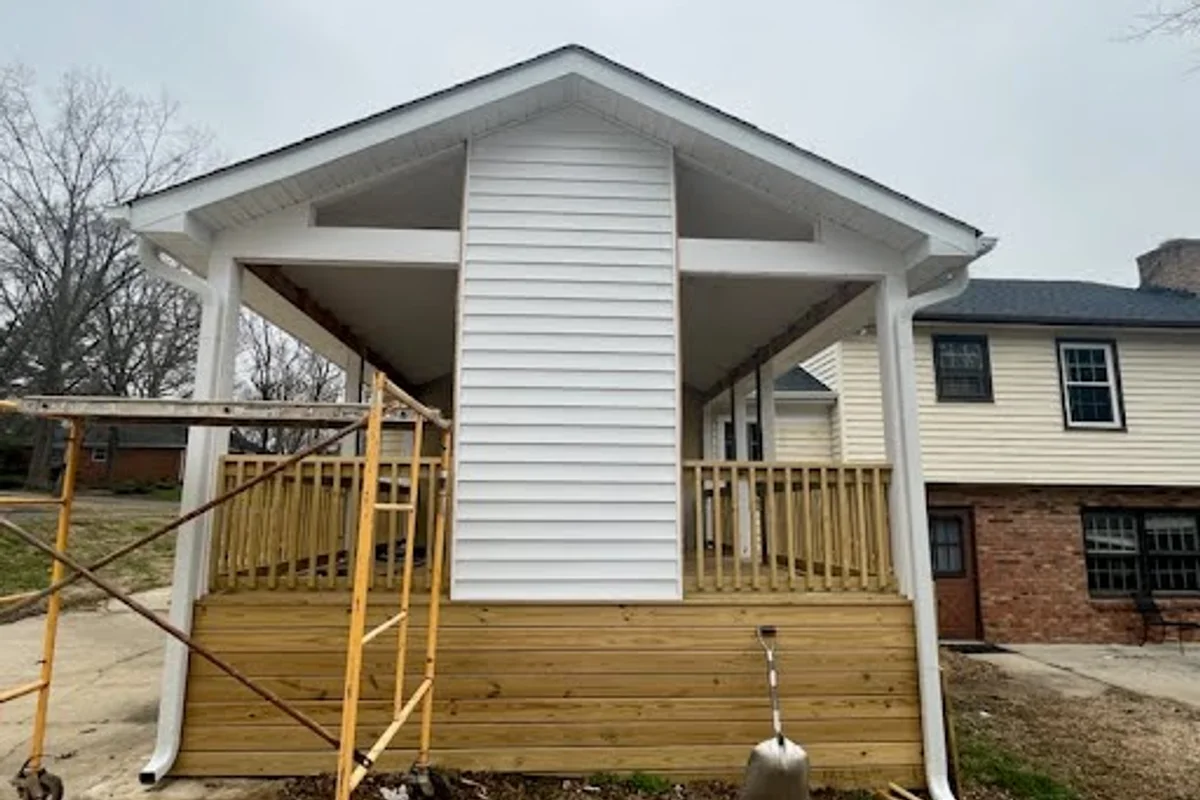 Completed 3-season vinyl film porch enclosure exterior in Summerlin, Charlotte NC