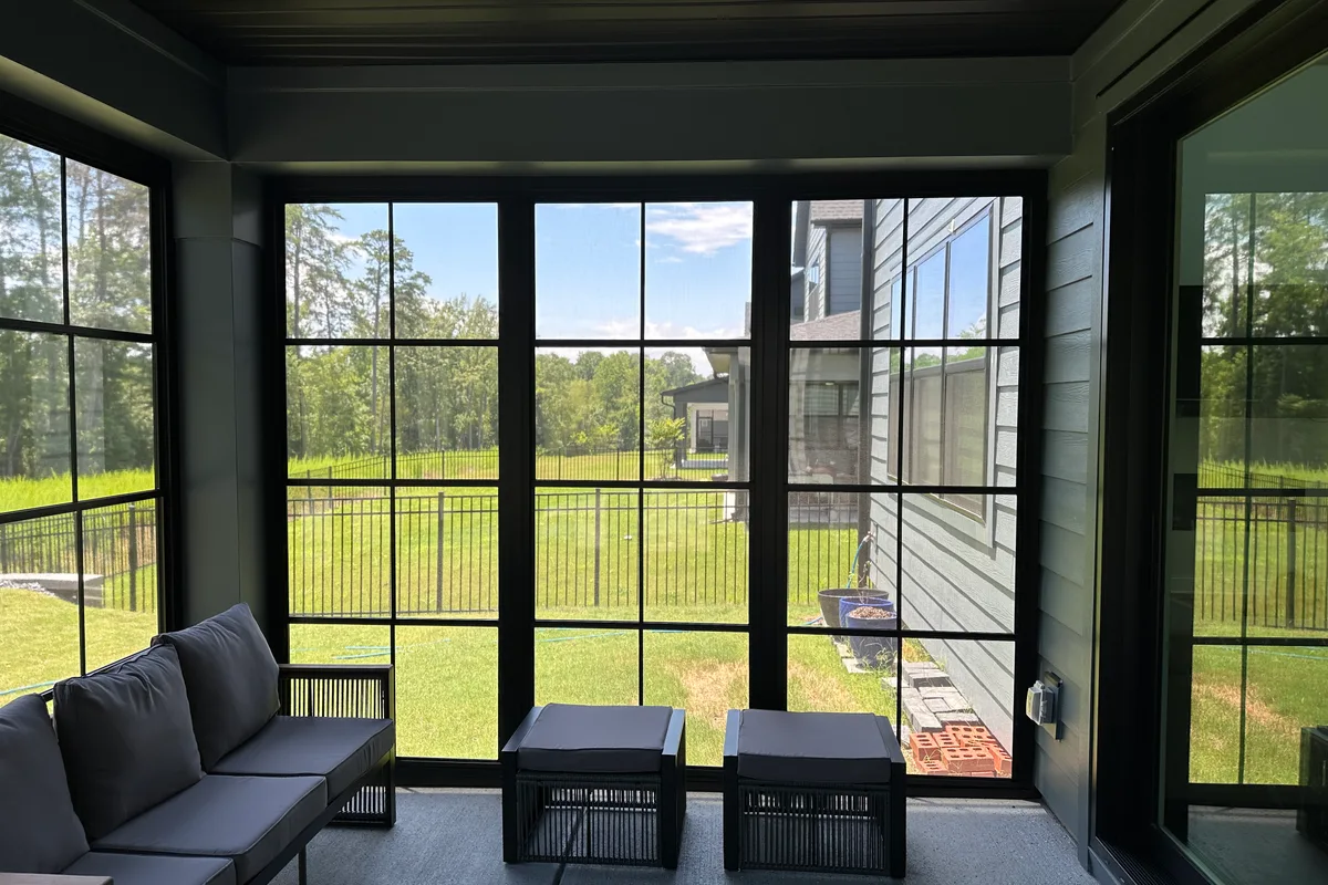 Finished vinyl film enclosure detail on 3-season porch Tega Cay