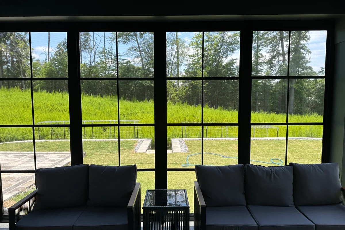 Professional vinyl film porch enclosure installation Tega Cay SC detail