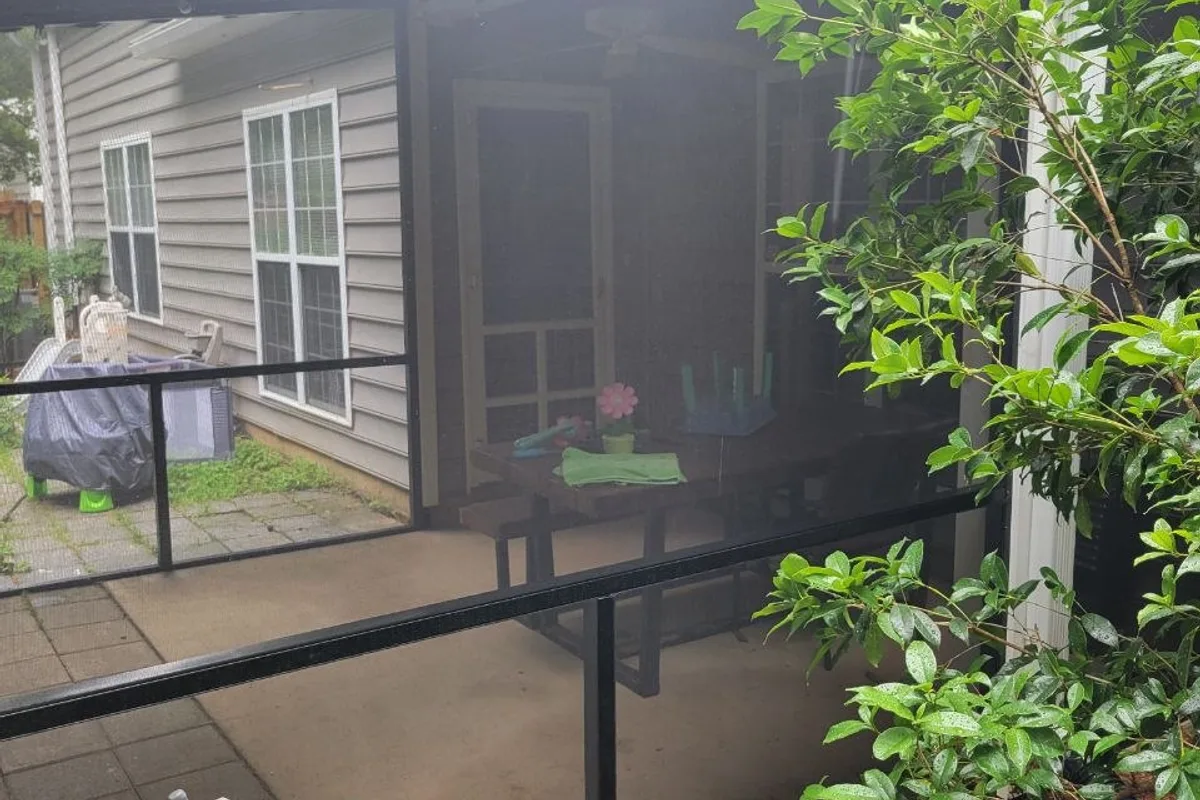 Detailed view of installed screen enclosure framing and screening in Charlotte NC