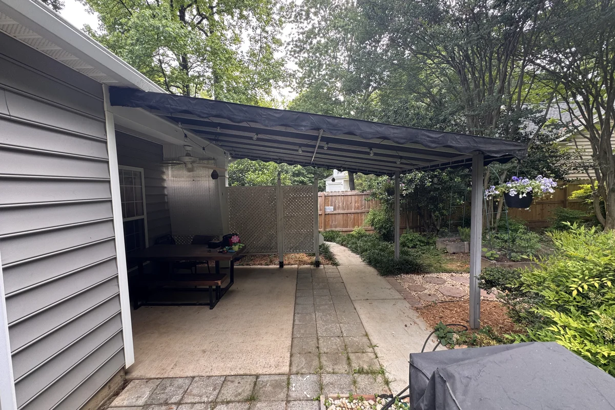 Completed screen enclosure exterior view in Thorston Hill, Charlotte NC showcasing finished screened porch project